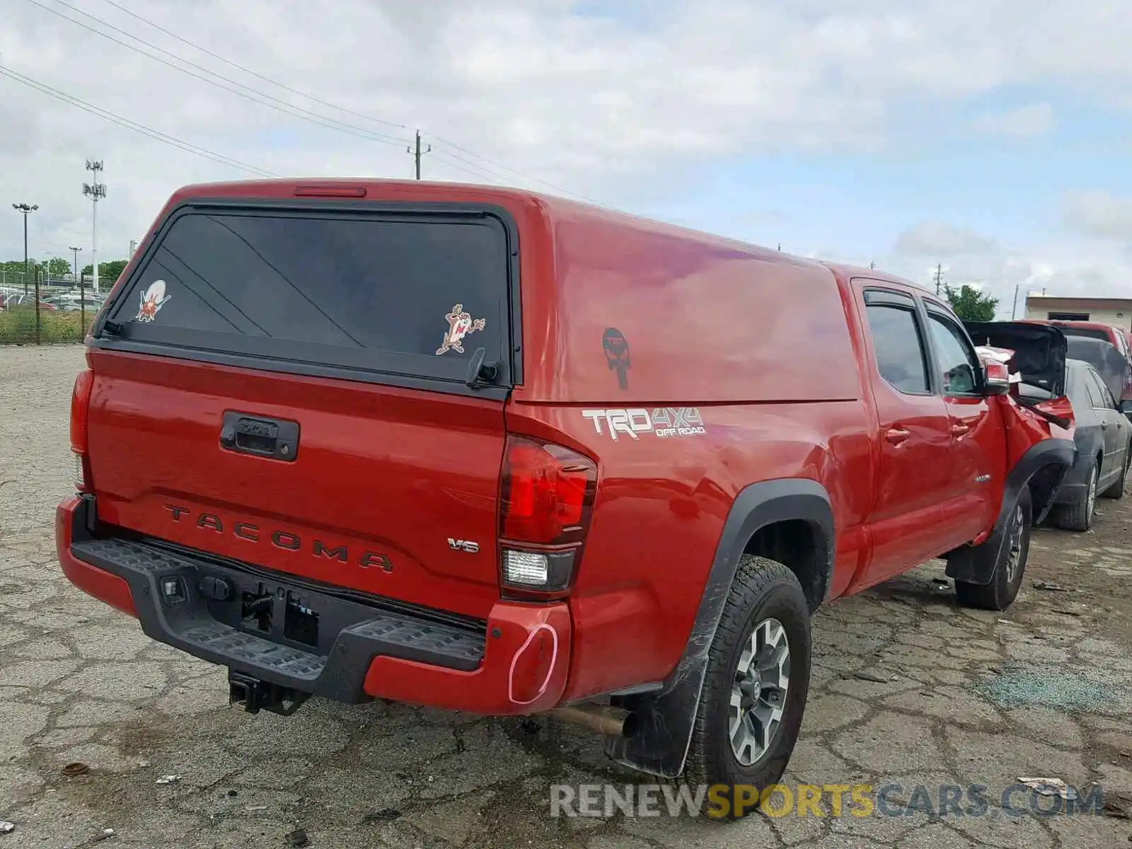 4 Photograph of a damaged car 3TMDZ5BN4KM056942 TOYOTA TACOMA DOU 2019