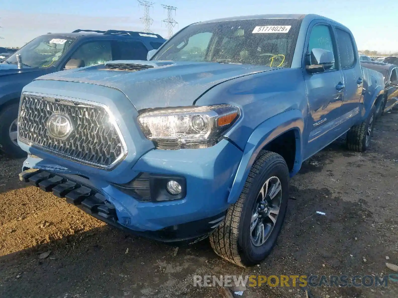 2 Photograph of a damaged car 3TMDZ5BN4KM064538 TOYOTA TACOMA DOU 2019