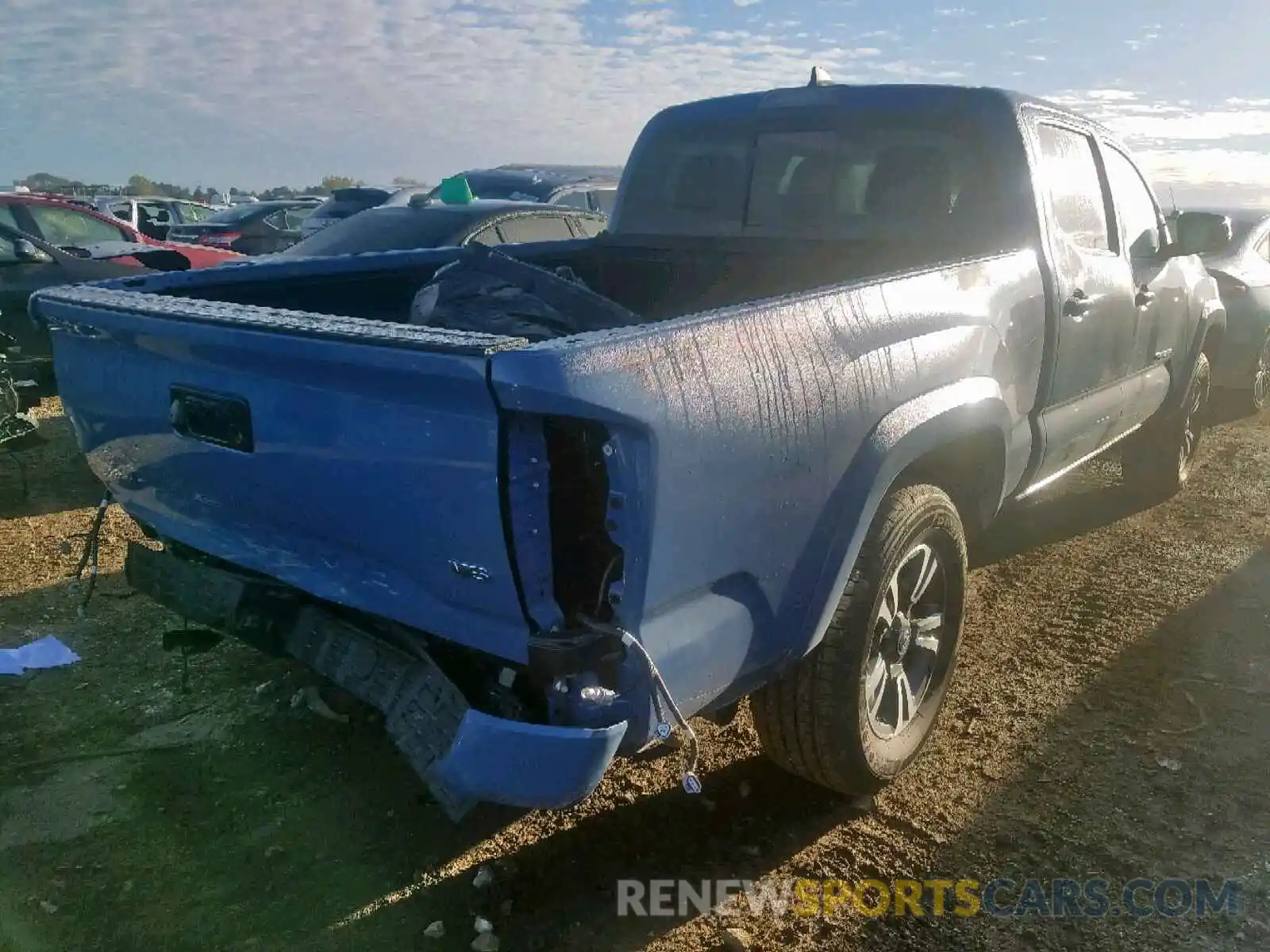 4 Photograph of a damaged car 3TMDZ5BN4KM064538 TOYOTA TACOMA DOU 2019