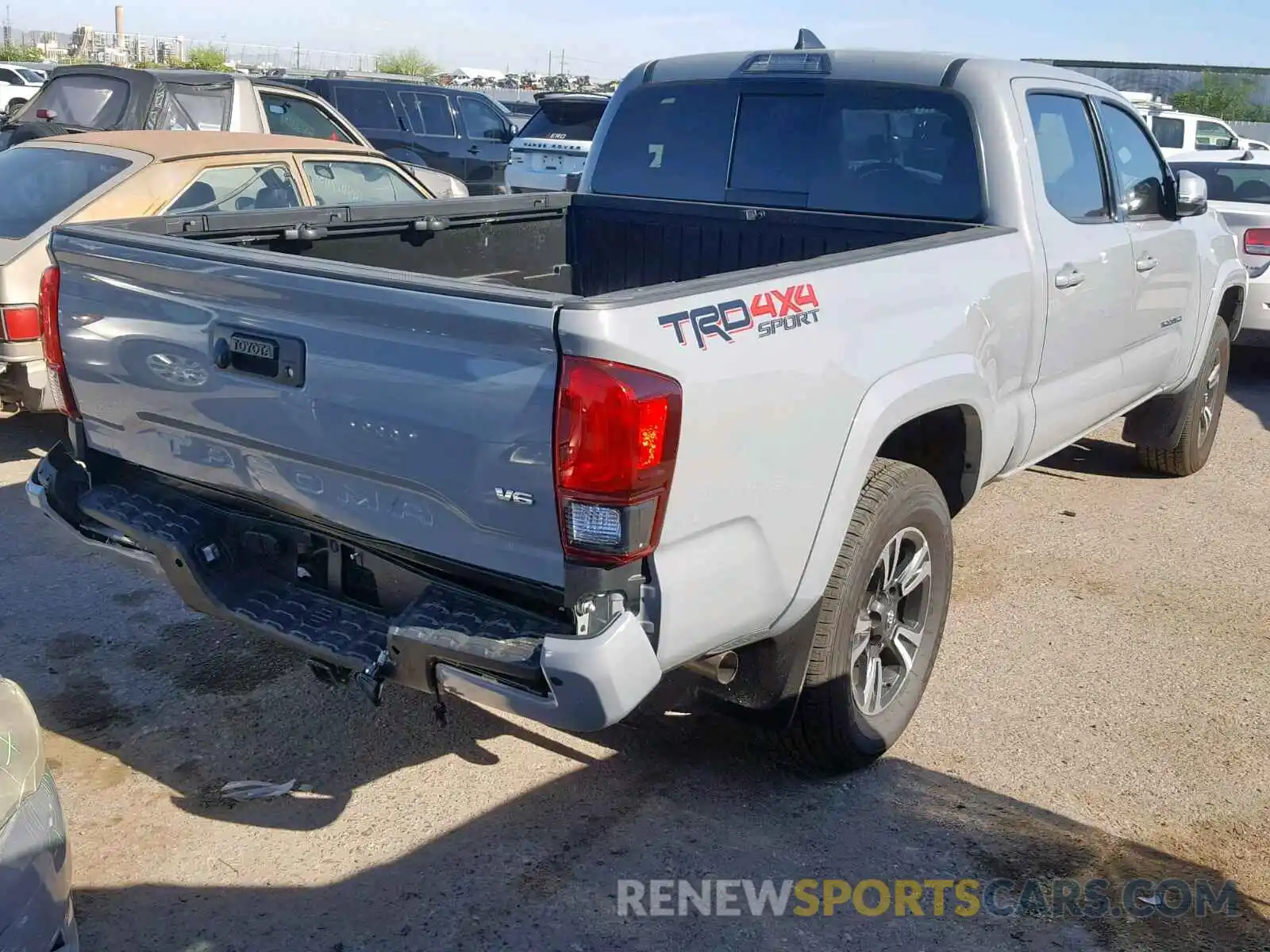 4 Photograph of a damaged car 3TMDZ5BN4KM066645 TOYOTA TACOMA DOU 2019