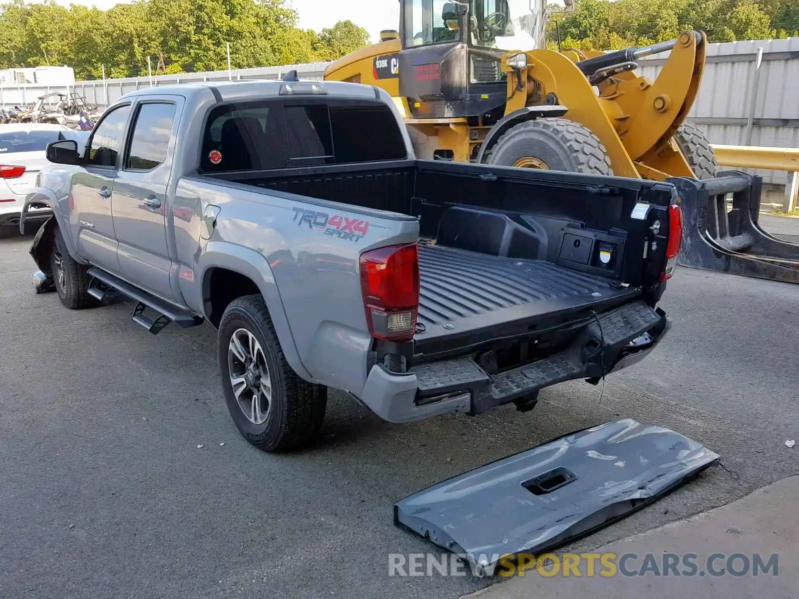 4 Photograph of a damaged car 3TMDZ5BN6KM059227 TOYOTA TACOMA DOU 2019