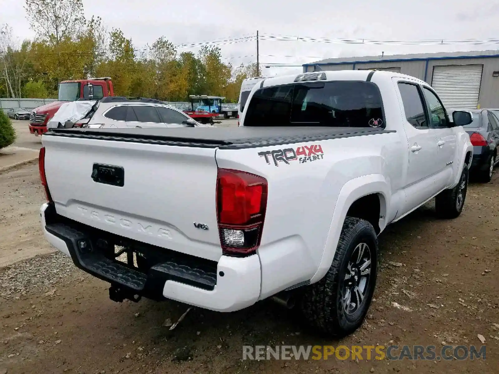 4 Photograph of a damaged car 3TMDZ5BN6KM061527 TOYOTA TACOMA DOU 2019