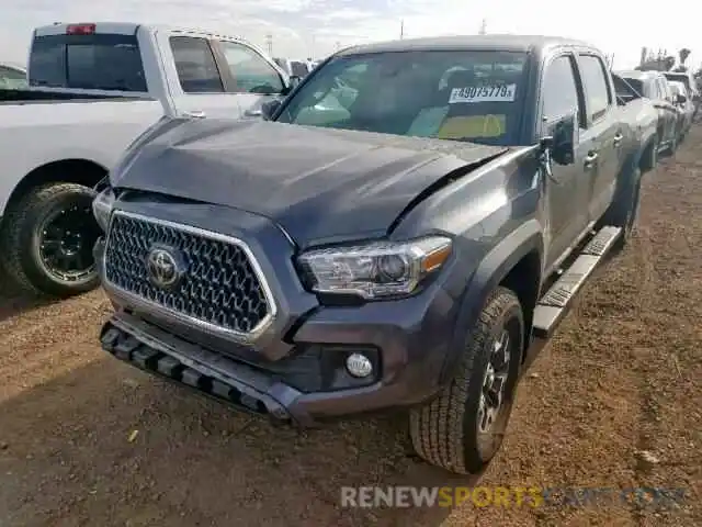 2 Photograph of a damaged car 3TMDZ5BN6KM068705 TOYOTA TACOMA DOU 2019