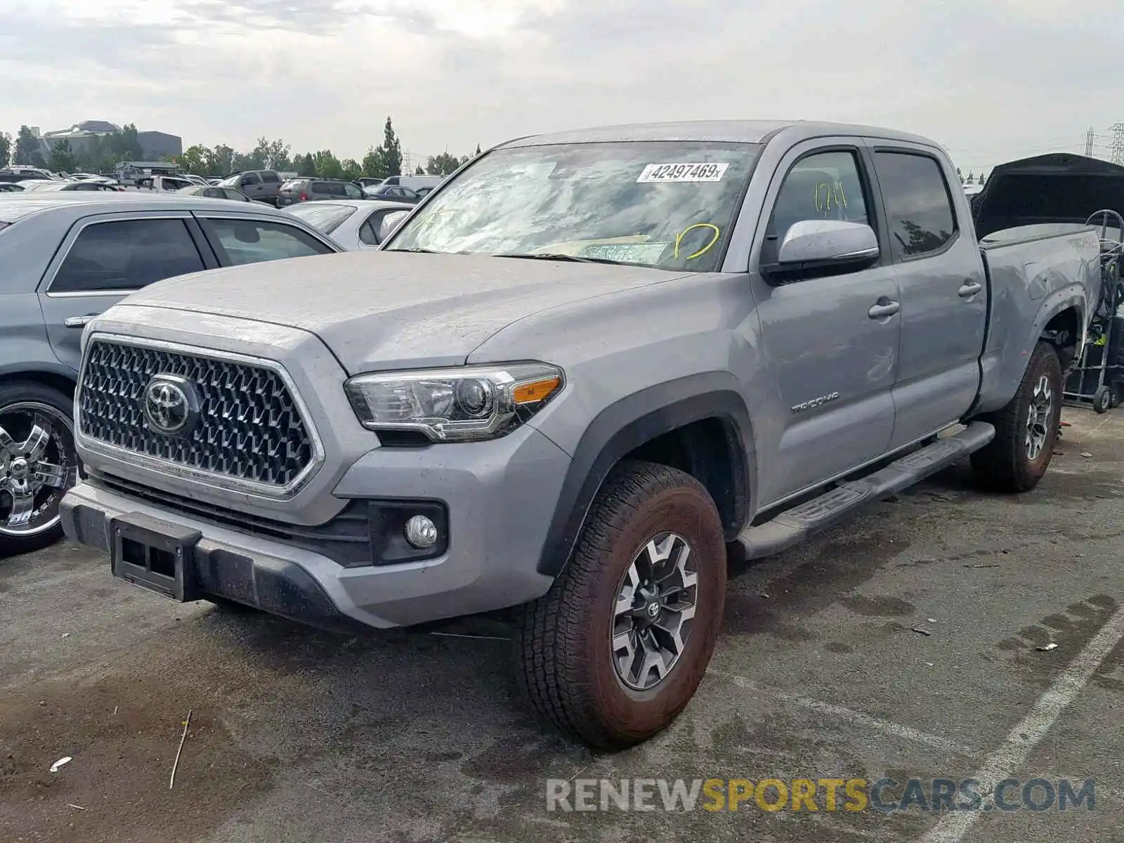 2 Photograph of a damaged car 3TMDZ5BN7KM065344 TOYOTA TACOMA DOU 2019