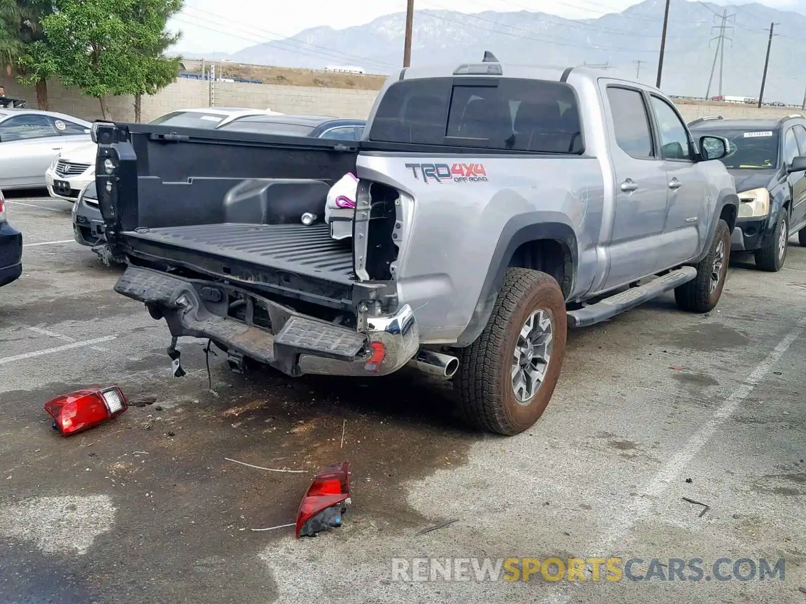 4 Photograph of a damaged car 3TMDZ5BN7KM065344 TOYOTA TACOMA DOU 2019