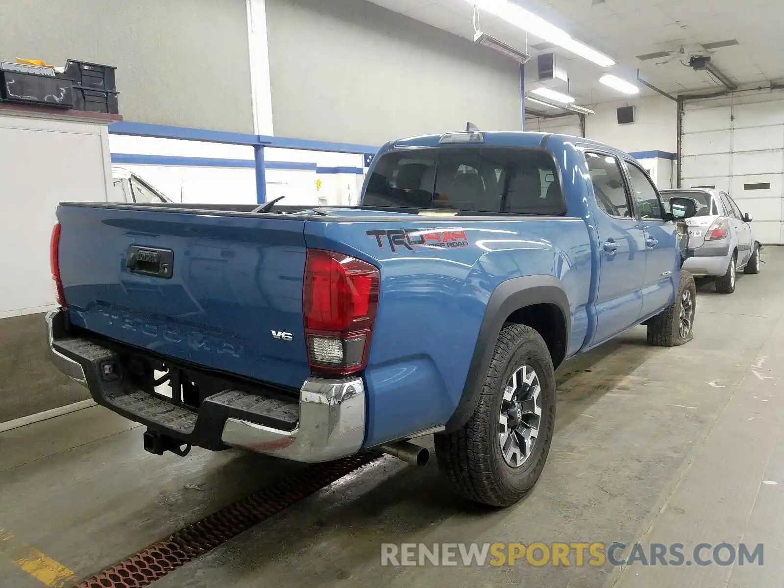 4 Photograph of a damaged car 3TMDZ5BN7KM074688 TOYOTA TACOMA DOU 2019