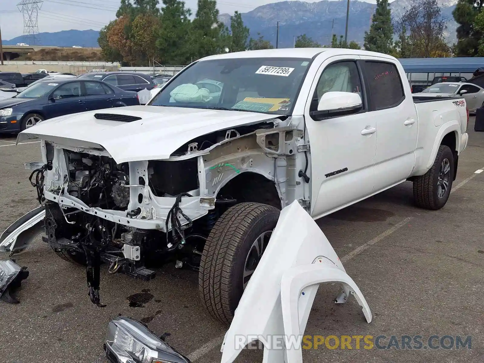 2 Photograph of a damaged car 3TMDZ5BN7KM078935 TOYOTA TACOMA DOU 2019