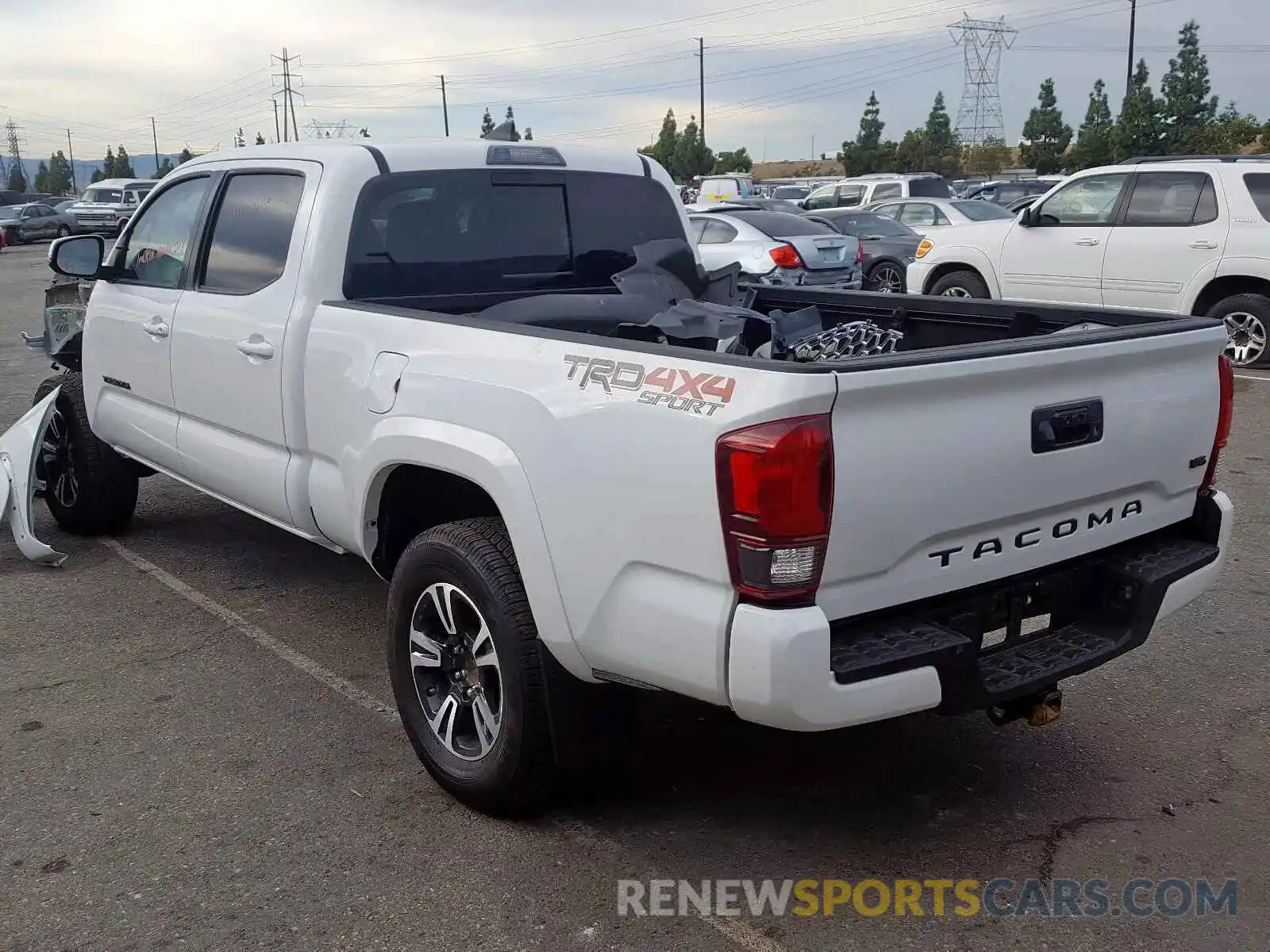 3 Photograph of a damaged car 3TMDZ5BN7KM078935 TOYOTA TACOMA DOU 2019