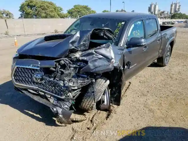 2 Photograph of a damaged car 3TMDZ5BNXKM061028 TOYOTA TACOMA DOU 2019