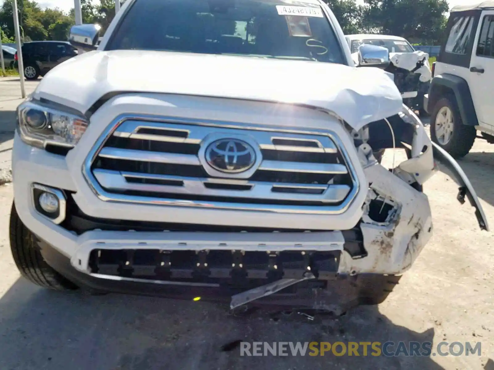 9 Photograph of a damaged car 3TMEZ5CN8KM096010 TOYOTA TACOMA DOU 2019