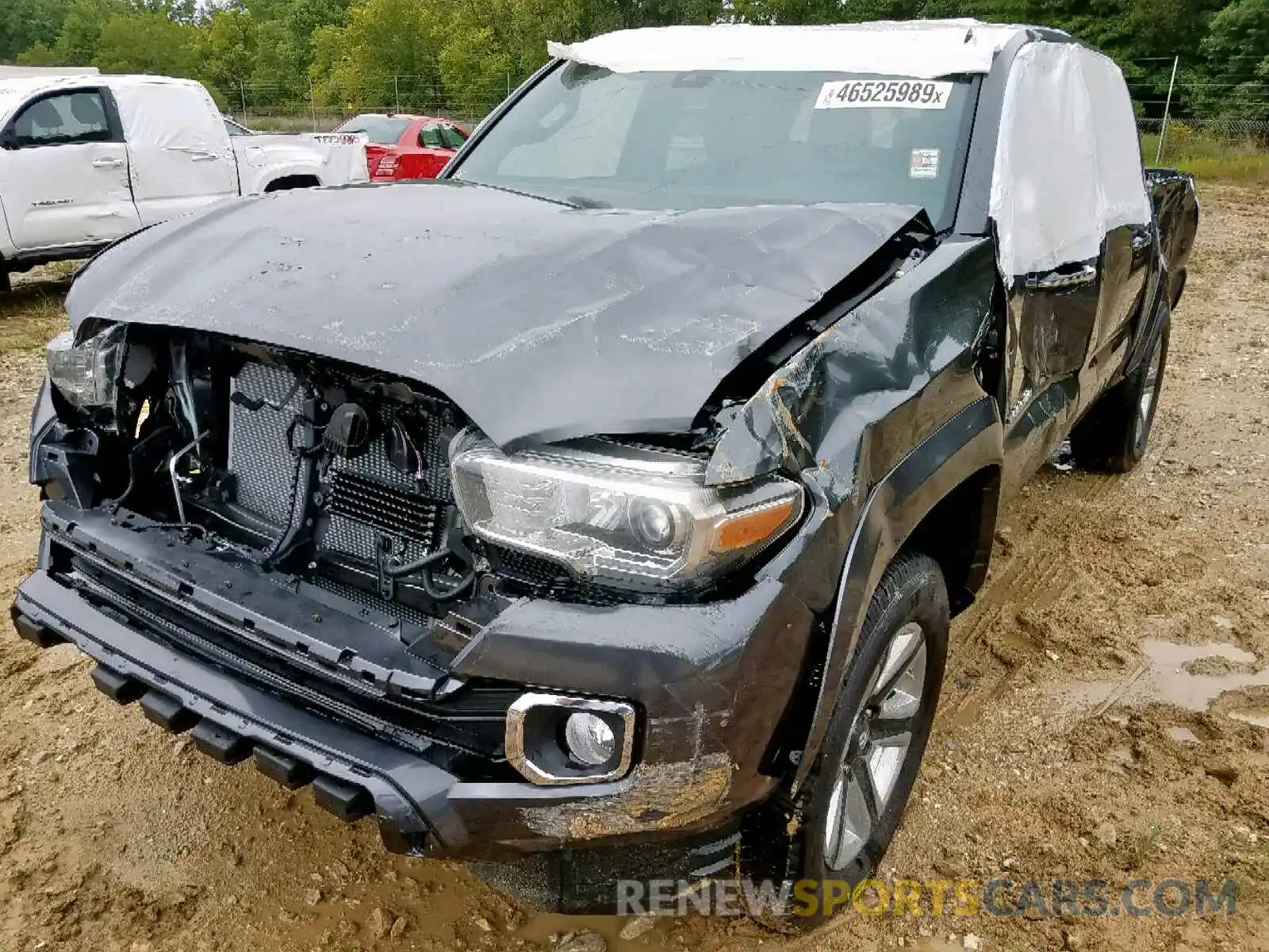 2 Photograph of a damaged car 3TMGZ5AN1KM246485 TOYOTA TACOMA DOU 2019