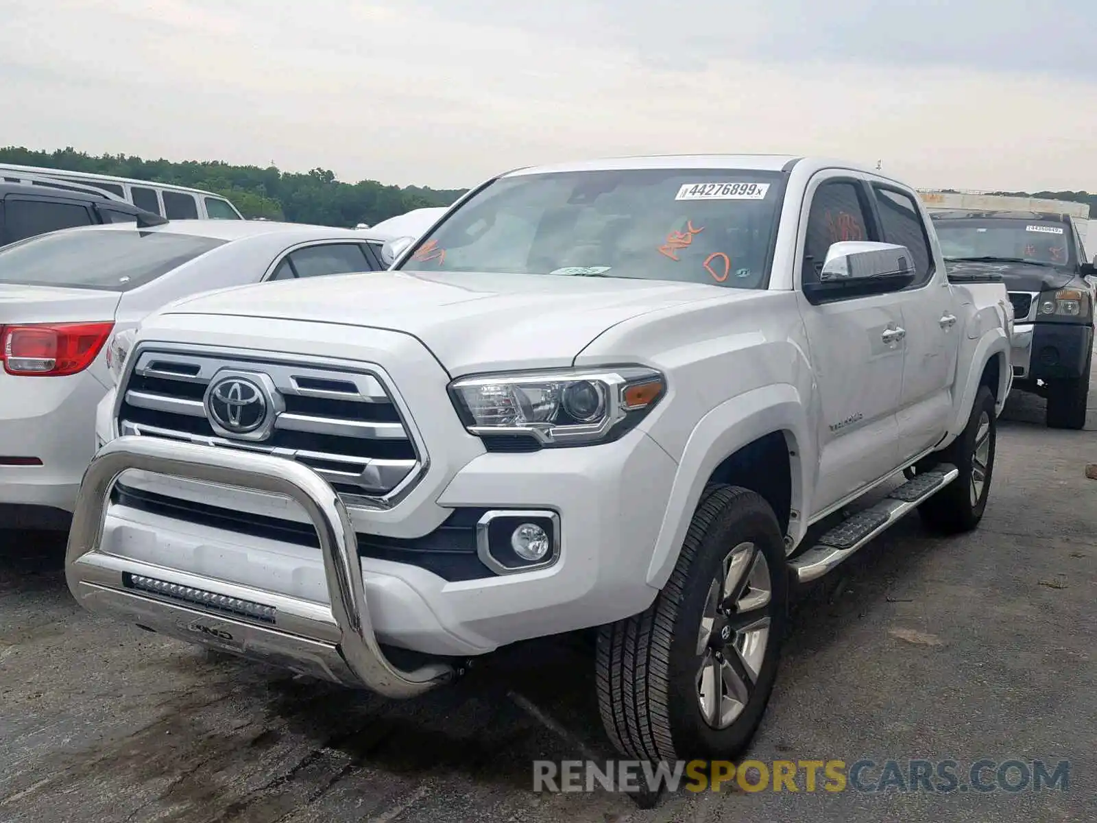 2 Photograph of a damaged car 3TMGZ5AN3KM194440 TOYOTA TACOMA DOU 2019