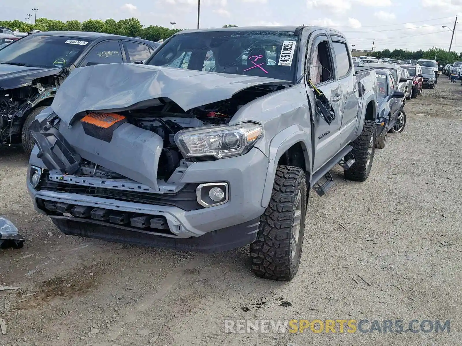 2 Photograph of a damaged car 3TMGZ5AN4KM214209 TOYOTA TACOMA DOU 2019