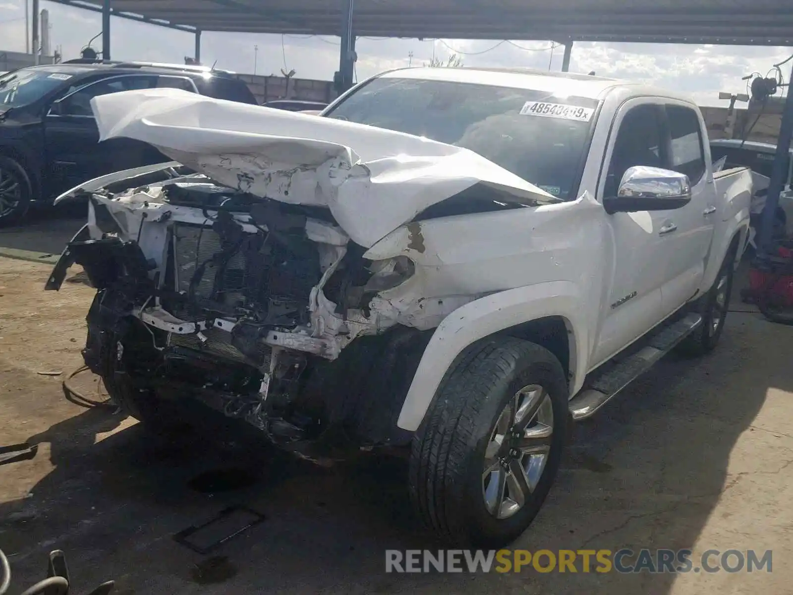 2 Photograph of a damaged car 3TMGZ5AN8KM211524 TOYOTA TACOMA DOU 2019