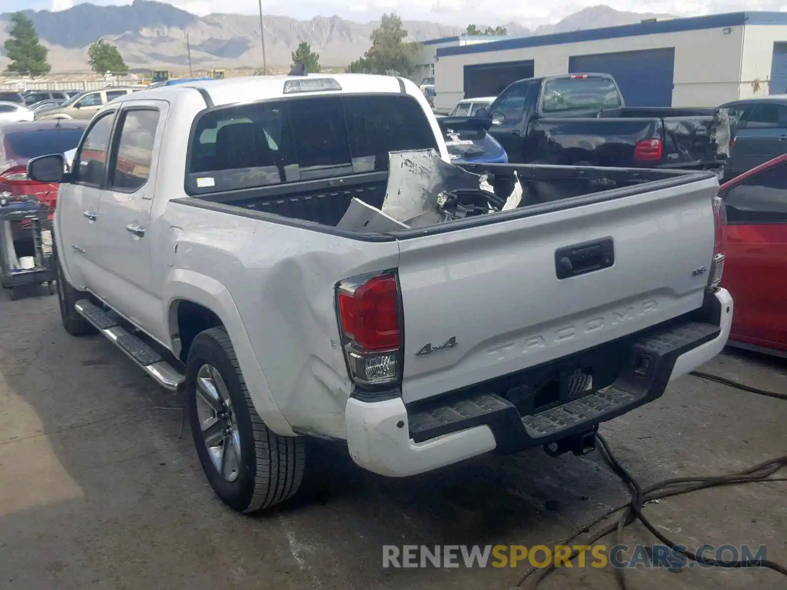 3 Photograph of a damaged car 3TMGZ5AN8KM211524 TOYOTA TACOMA DOU 2019