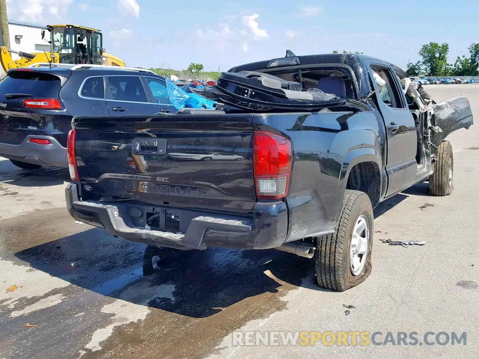 4 Photograph of a damaged car 5TFAX5GN1KX135836 TOYOTA TACOMA DOU 2019