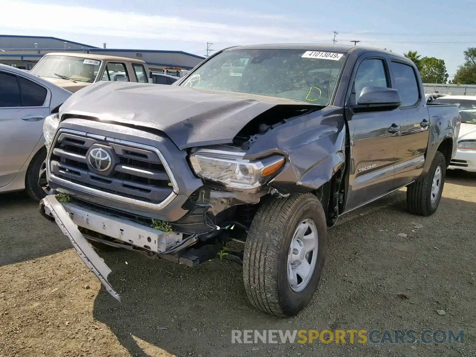 2 Photograph of a damaged car 5TFAX5GN2KX134386 TOYOTA TACOMA DOU 2019