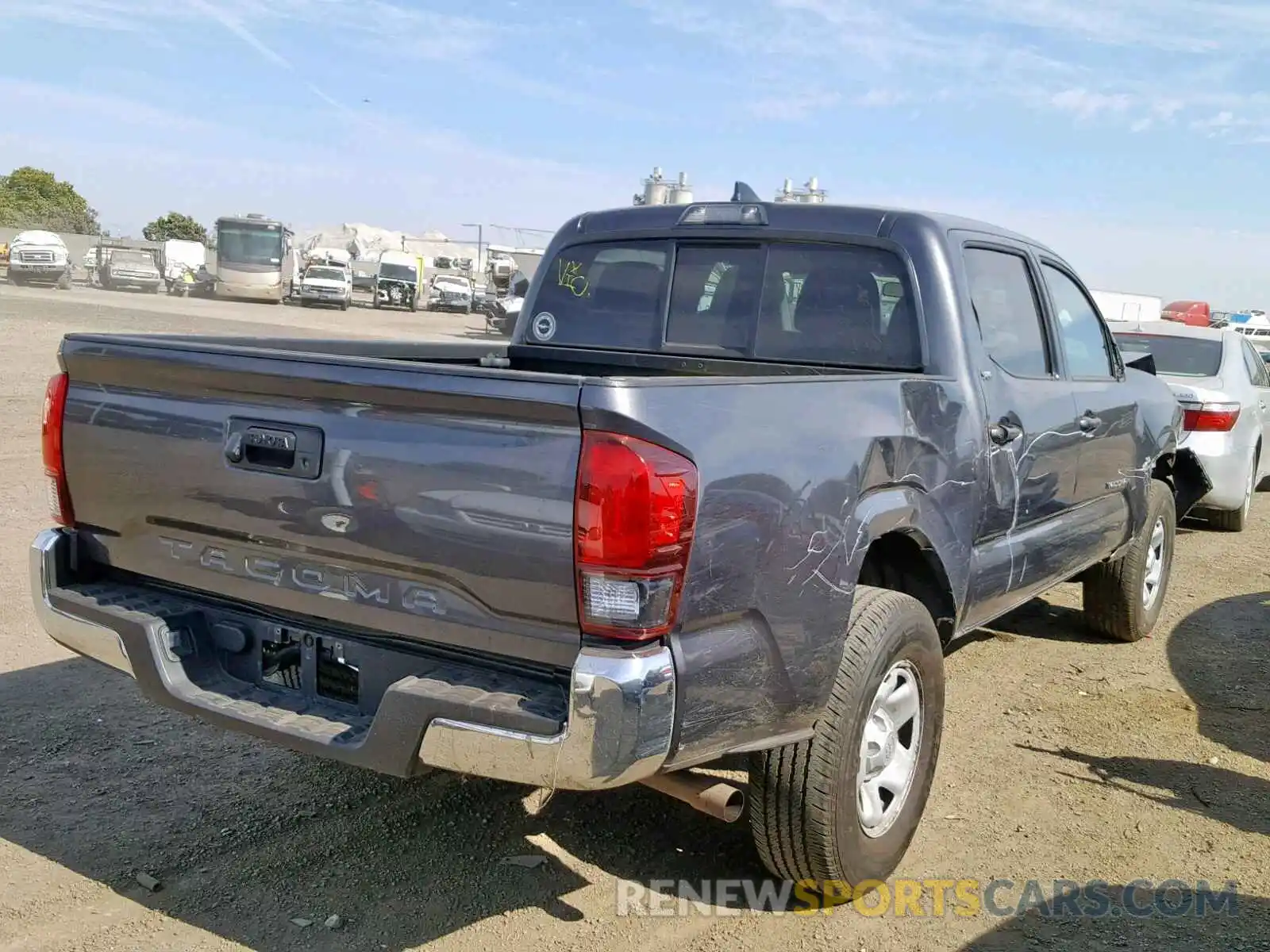 4 Photograph of a damaged car 5TFAX5GN2KX134386 TOYOTA TACOMA DOU 2019