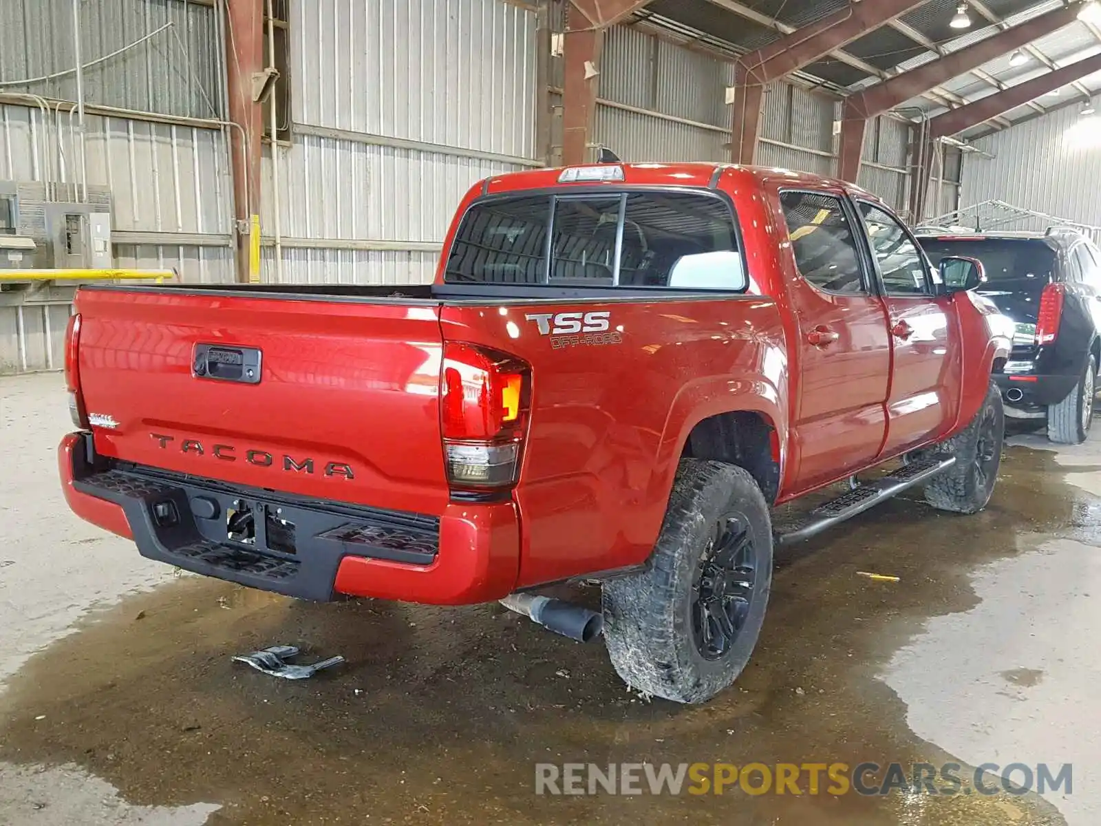 4 Photograph of a damaged car 5TFAX5GN2KX135697 TOYOTA TACOMA DOU 2019