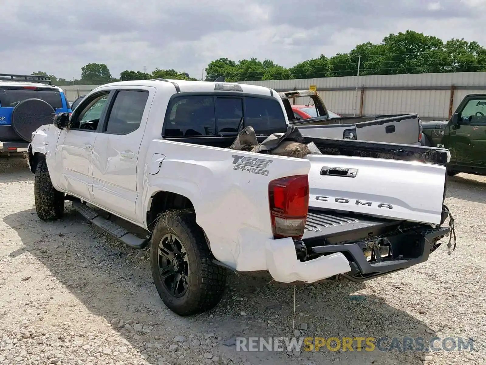 3 Photograph of a damaged car 5TFAX5GN2KX143864 TOYOTA TACOMA DOU 2019