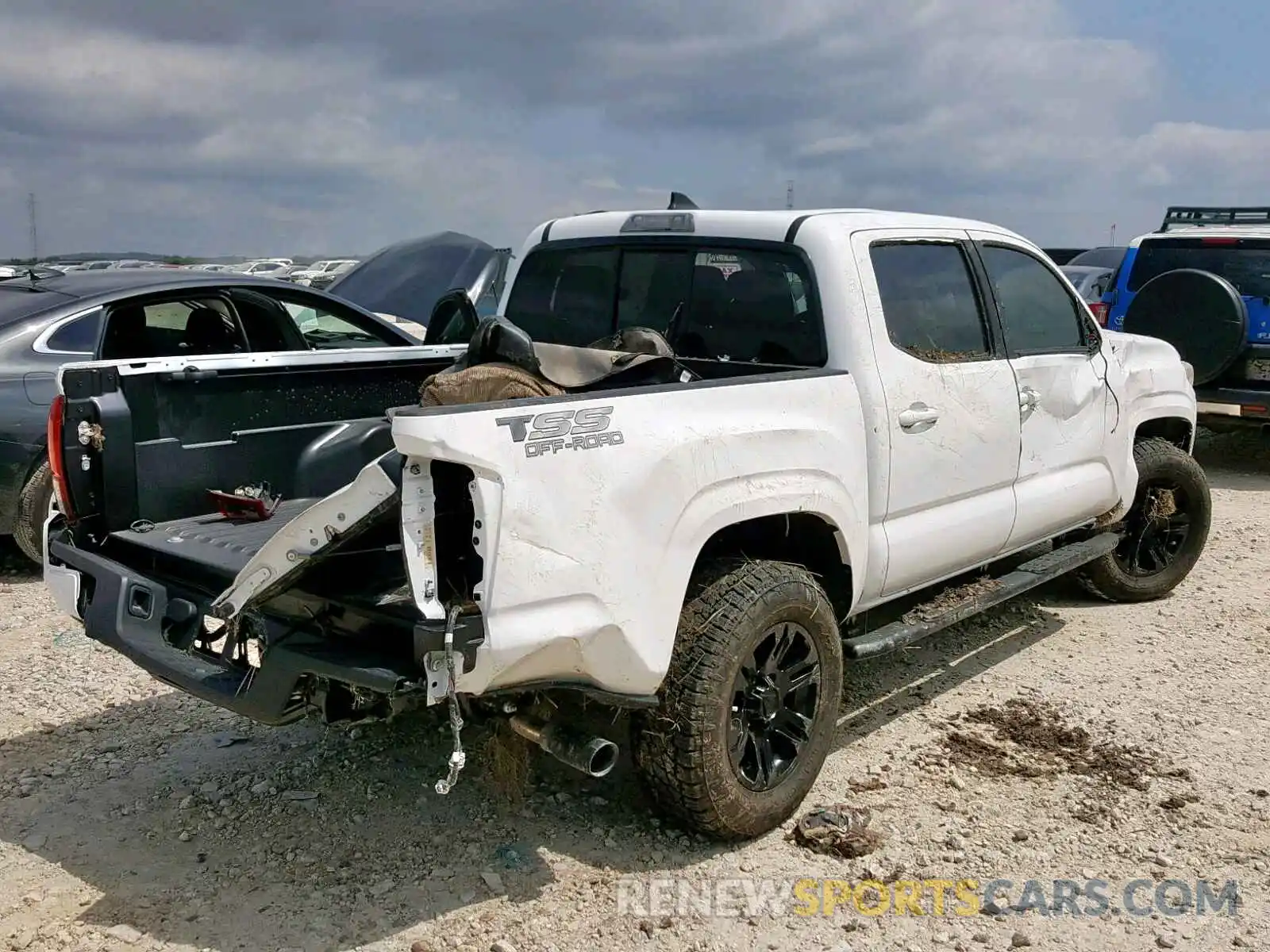 4 Photograph of a damaged car 5TFAX5GN2KX143864 TOYOTA TACOMA DOU 2019