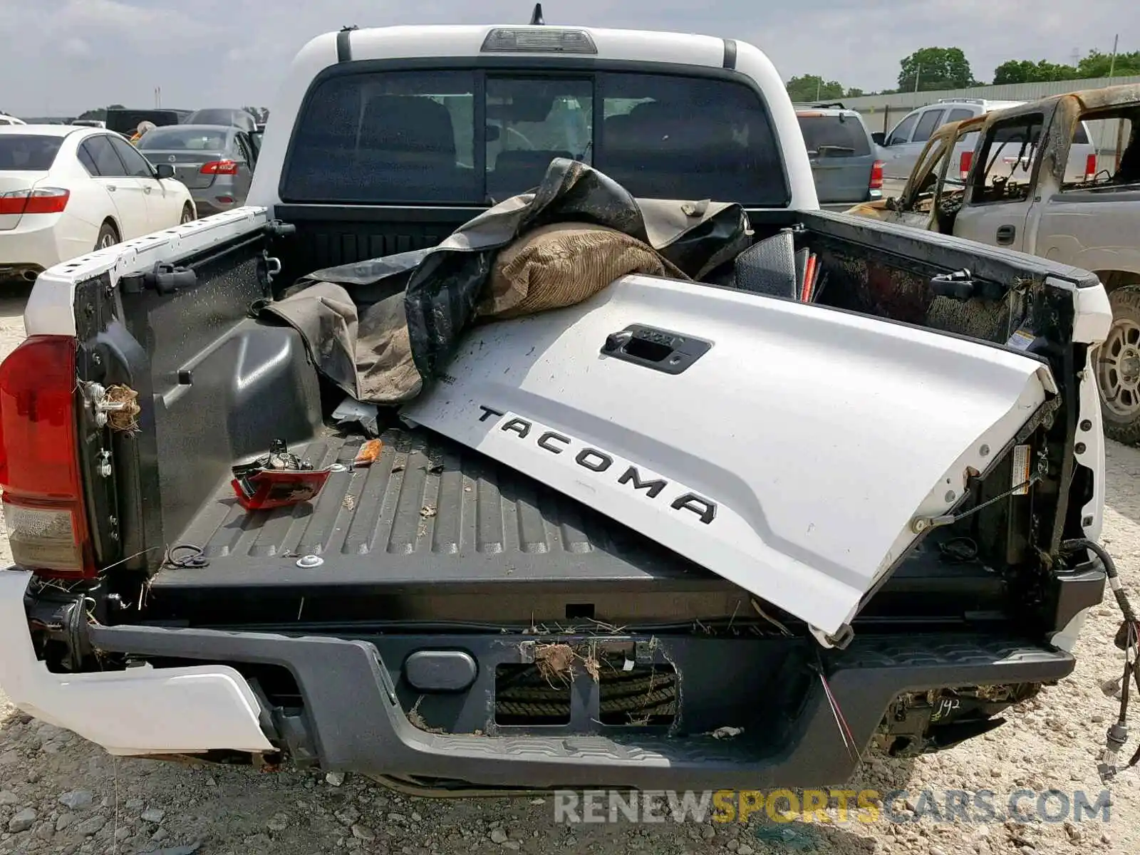 6 Photograph of a damaged car 5TFAX5GN2KX143864 TOYOTA TACOMA DOU 2019