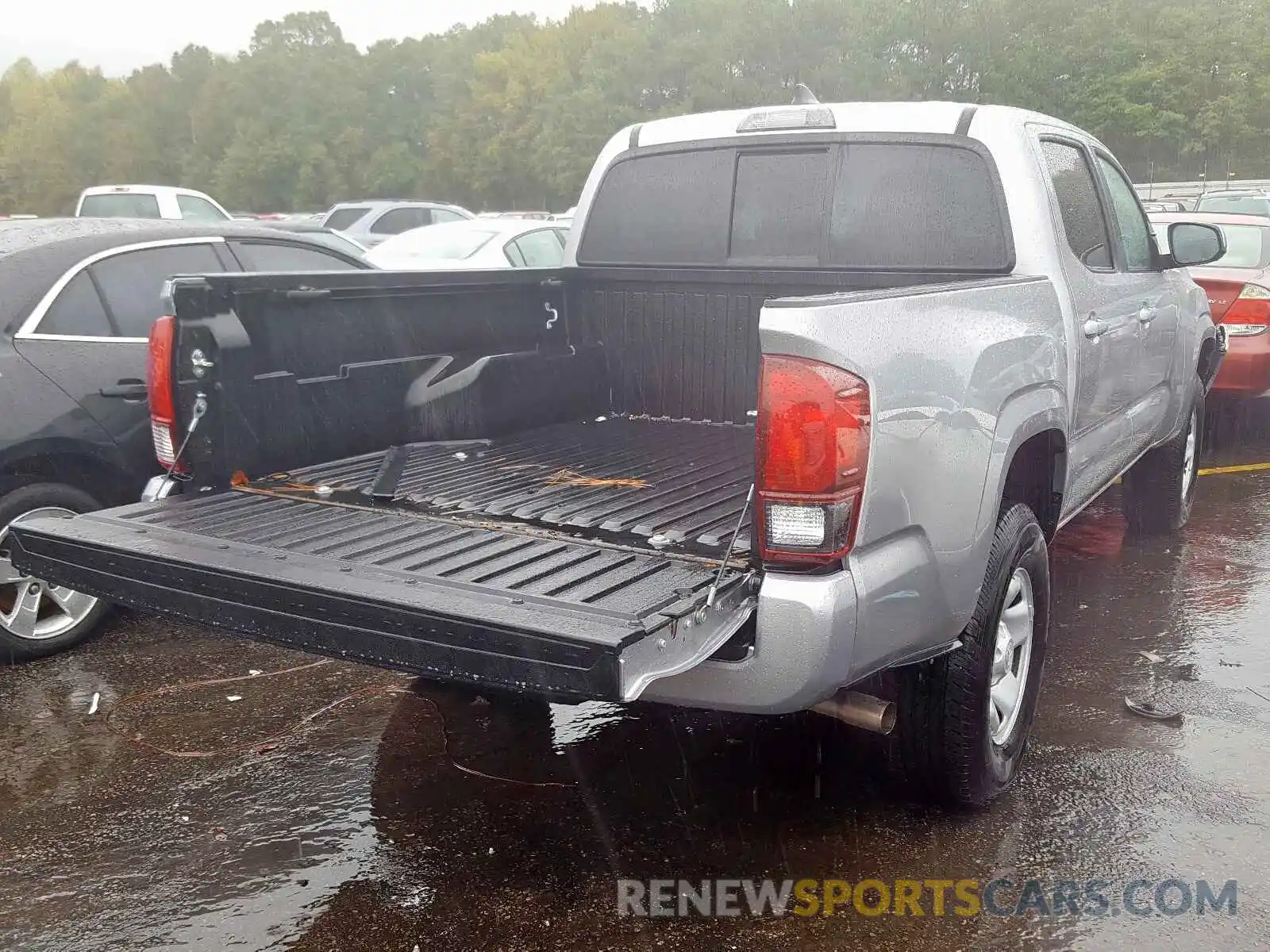 4 Photograph of a damaged car 5TFAX5GN3KX134011 TOYOTA TACOMA DOU 2019