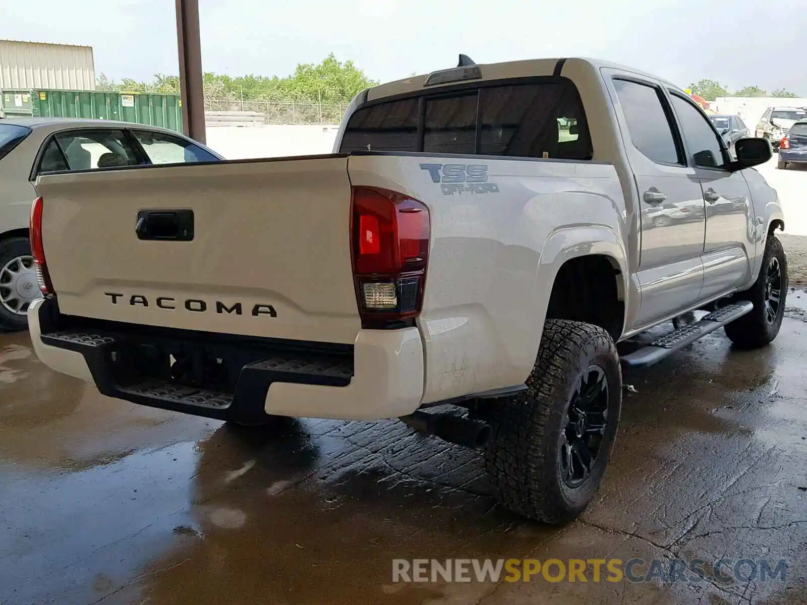 4 Photograph of a damaged car 5TFAX5GN3KX134607 TOYOTA TACOMA DOU 2019