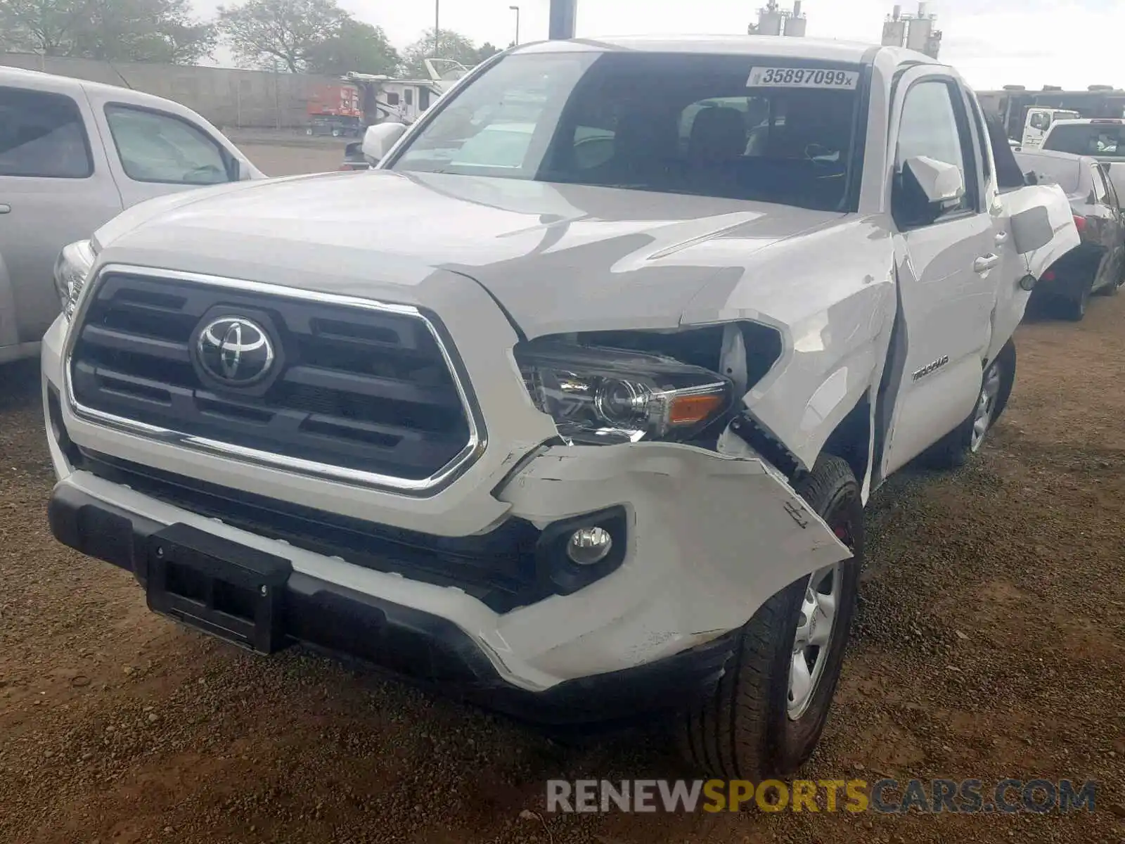 2 Photograph of a damaged car 5TFAX5GN3KX134879 TOYOTA TACOMA DOU 2019