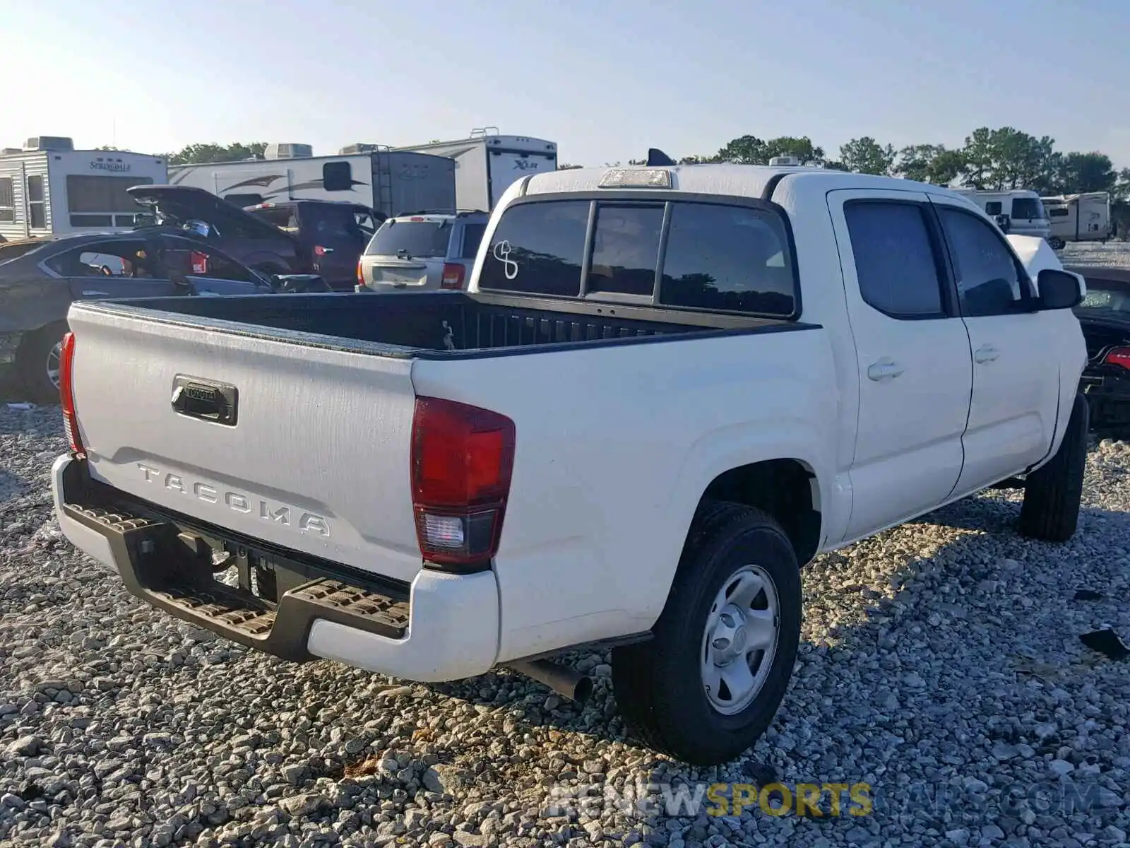 4 Photograph of a damaged car 5TFAX5GN3KX136390 TOYOTA TACOMA DOU 2019