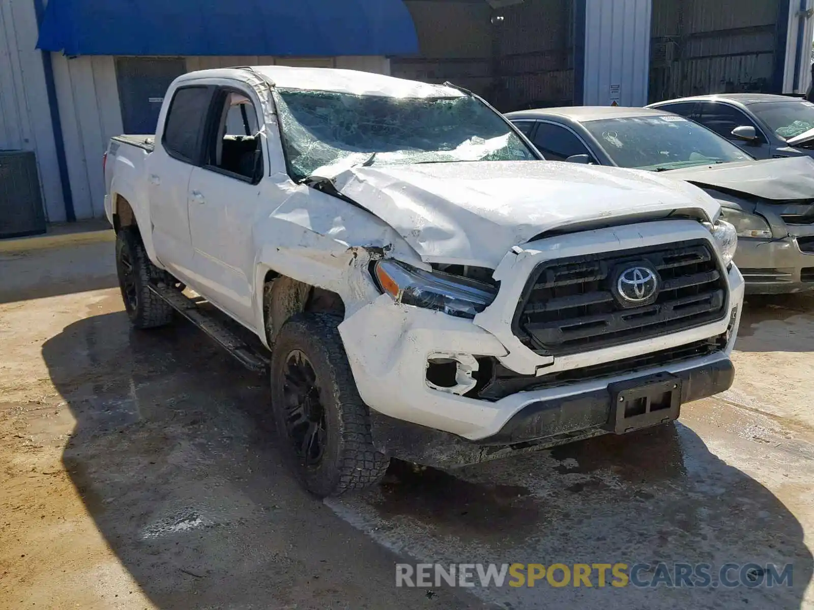 1 Photograph of a damaged car 5TFAX5GN5KX140876 TOYOTA TACOMA DOU 2019