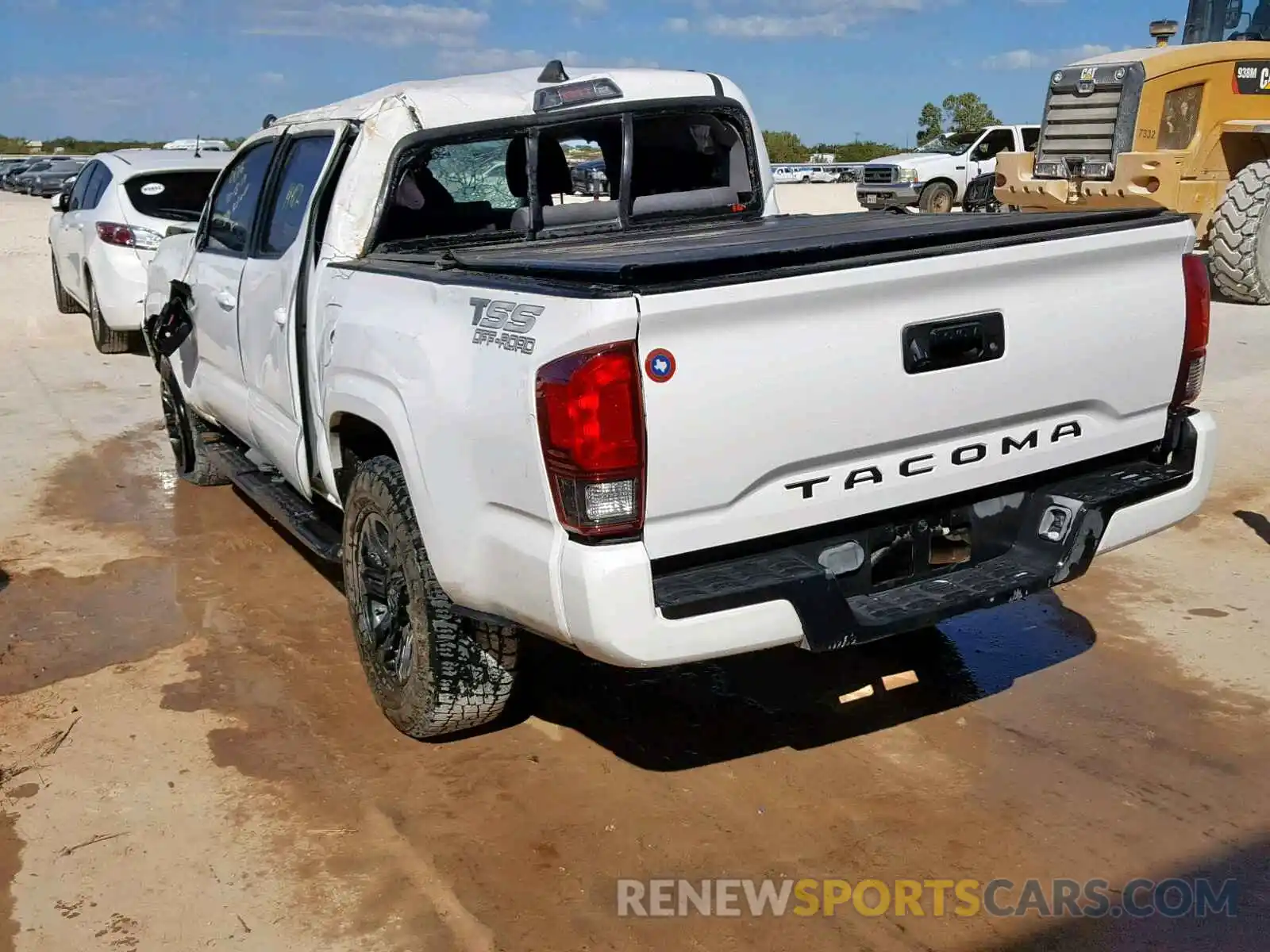 3 Photograph of a damaged car 5TFAX5GN5KX140876 TOYOTA TACOMA DOU 2019