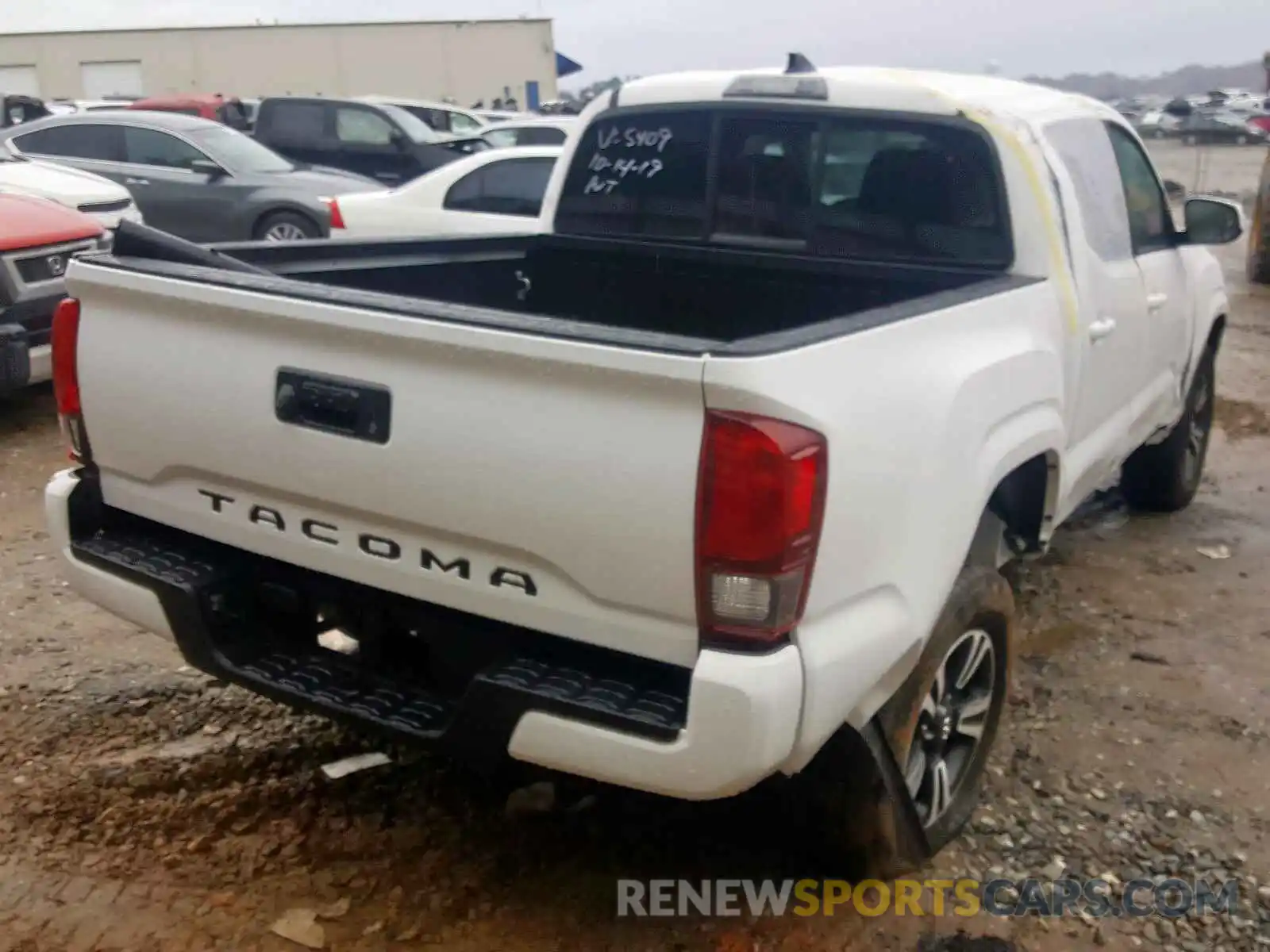 4 Photograph of a damaged car 5TFAX5GN5KX155409 TOYOTA TACOMA DOU 2019