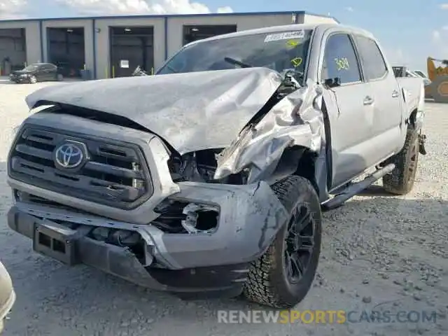 2 Photograph of a damaged car 5TFAX5GN5KX156446 TOYOTA TACOMA DOU 2019