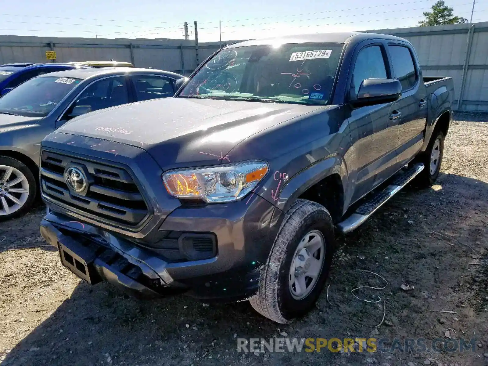 2 Photograph of a damaged car 5TFAX5GN6KX136609 TOYOTA TACOMA DOU 2019