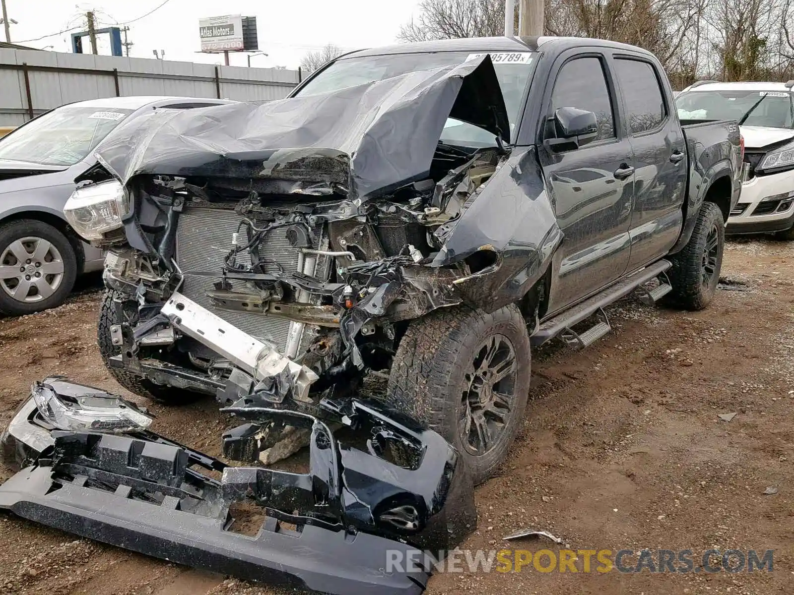 2 Photograph of a damaged car 5TFAX5GN6KX138327 TOYOTA TACOMA DOU 2019