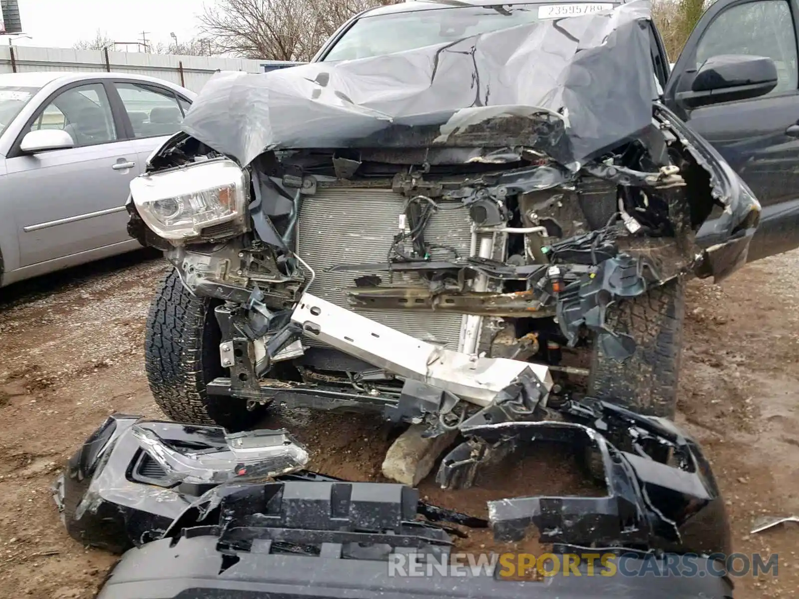 7 Photograph of a damaged car 5TFAX5GN6KX138327 TOYOTA TACOMA DOU 2019