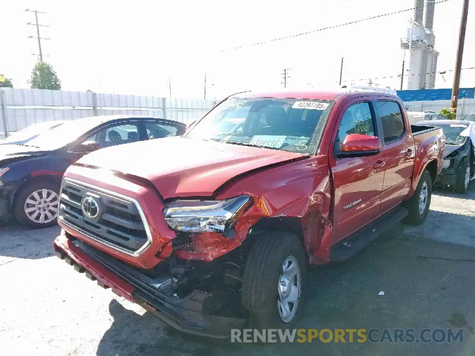 2 Photograph of a damaged car 5TFAX5GN6KX150848 TOYOTA TACOMA DOU 2019