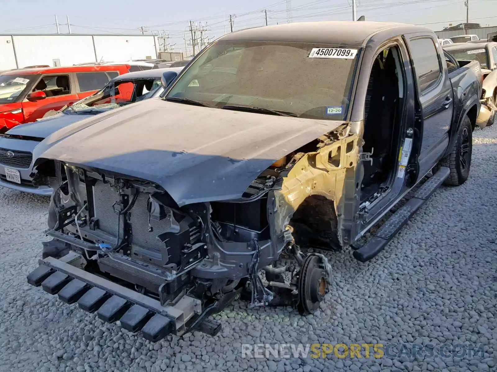 2 Photograph of a damaged car 5TFAX5GN7KX140197 TOYOTA TACOMA DOU 2019