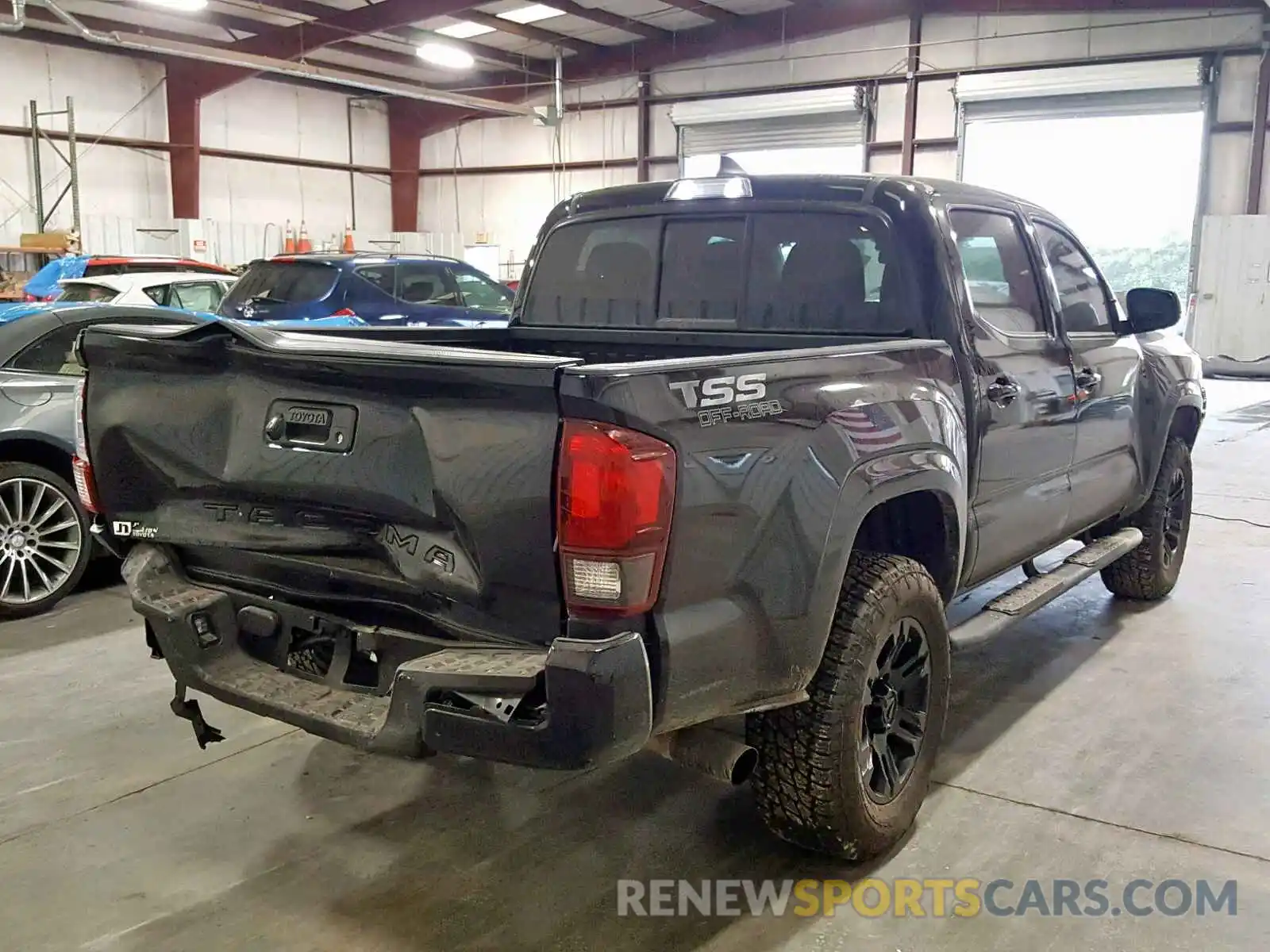 4 Photograph of a damaged car 5TFAX5GN7KX143861 TOYOTA TACOMA DOU 2019