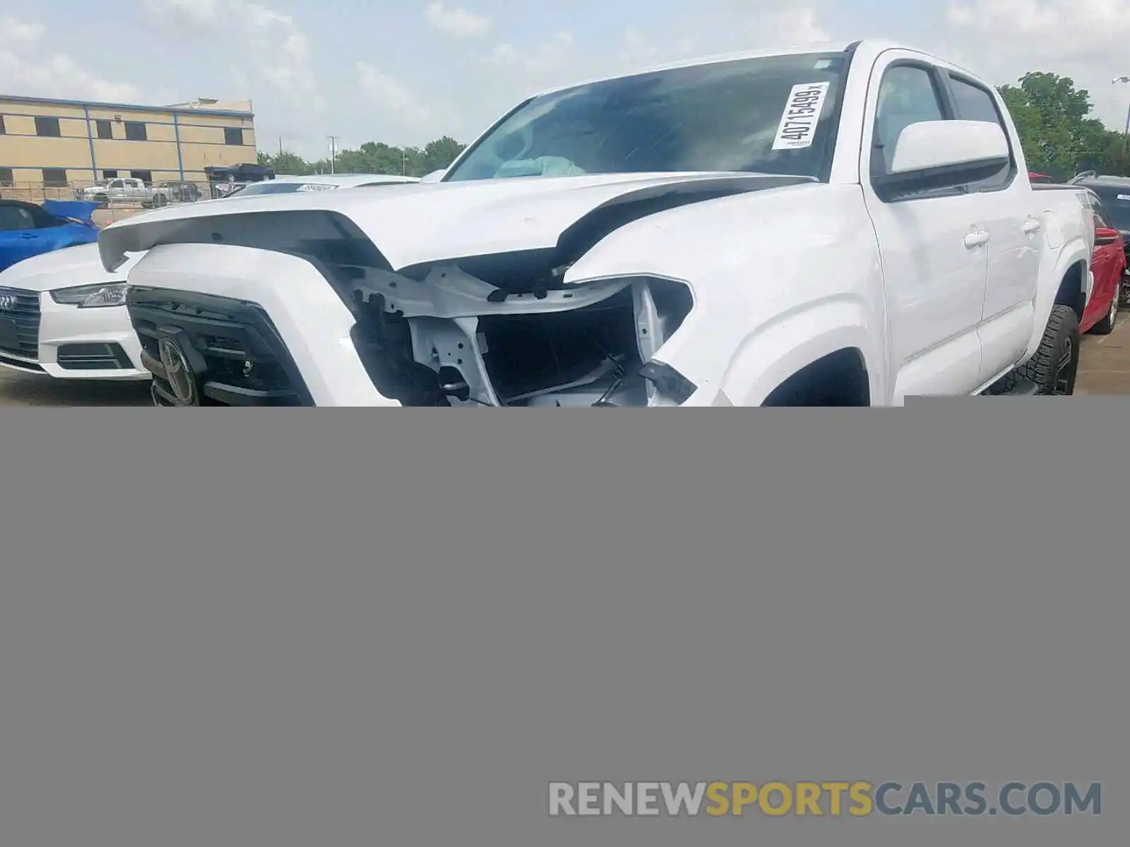 2 Photograph of a damaged car 5TFAX5GNXKX152585 TOYOTA TACOMA DOU 2019