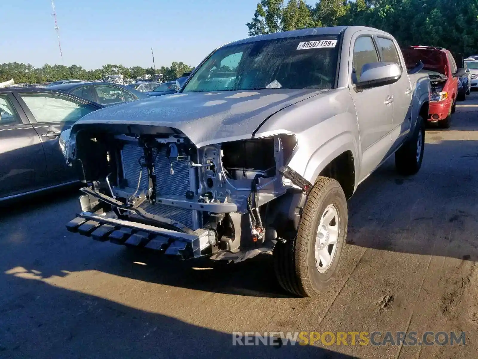 2 Photograph of a damaged car 5TFAX5GNXKX154238 TOYOTA TACOMA DOU 2019