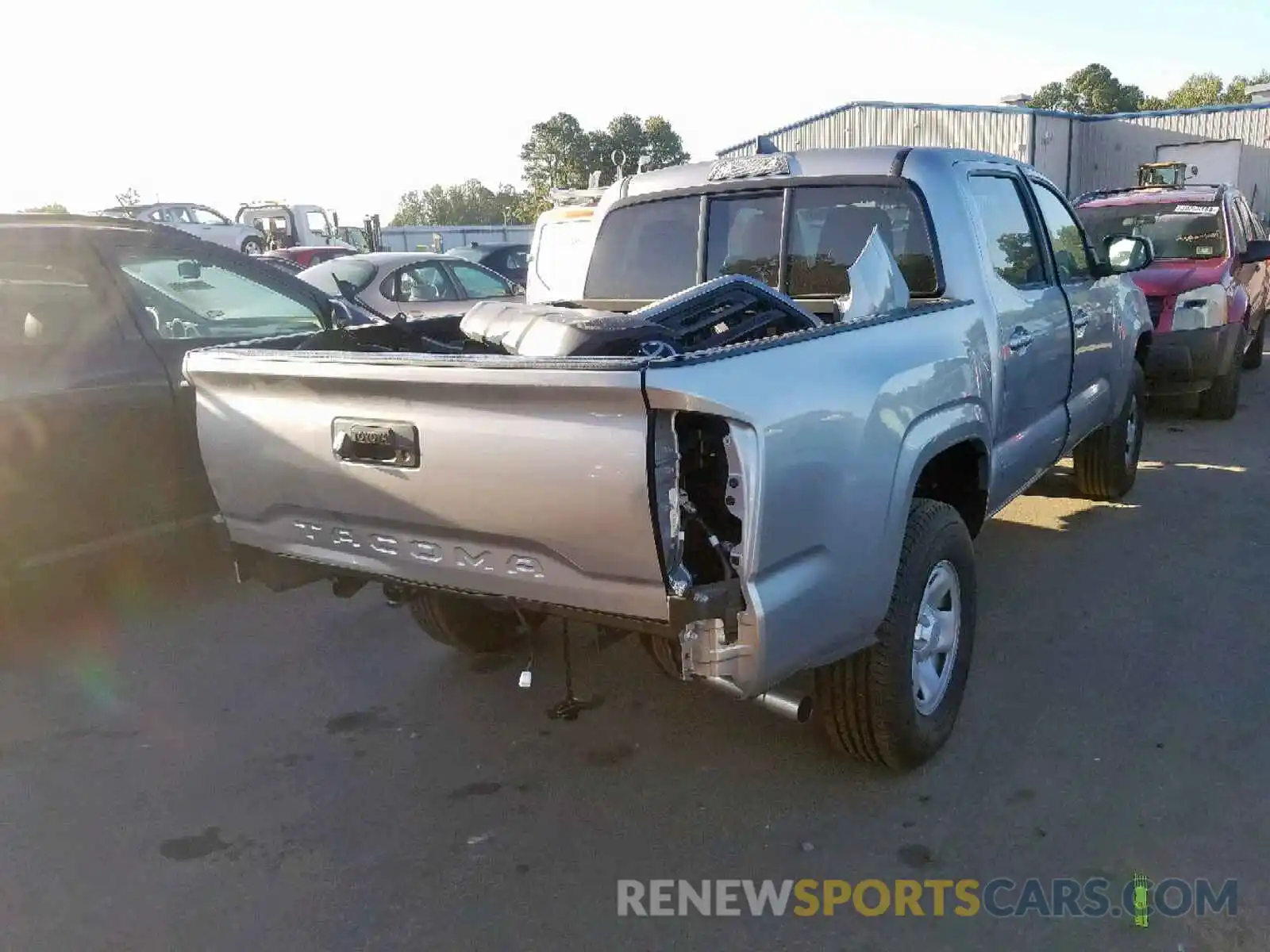 4 Photograph of a damaged car 5TFAX5GNXKX154238 TOYOTA TACOMA DOU 2019