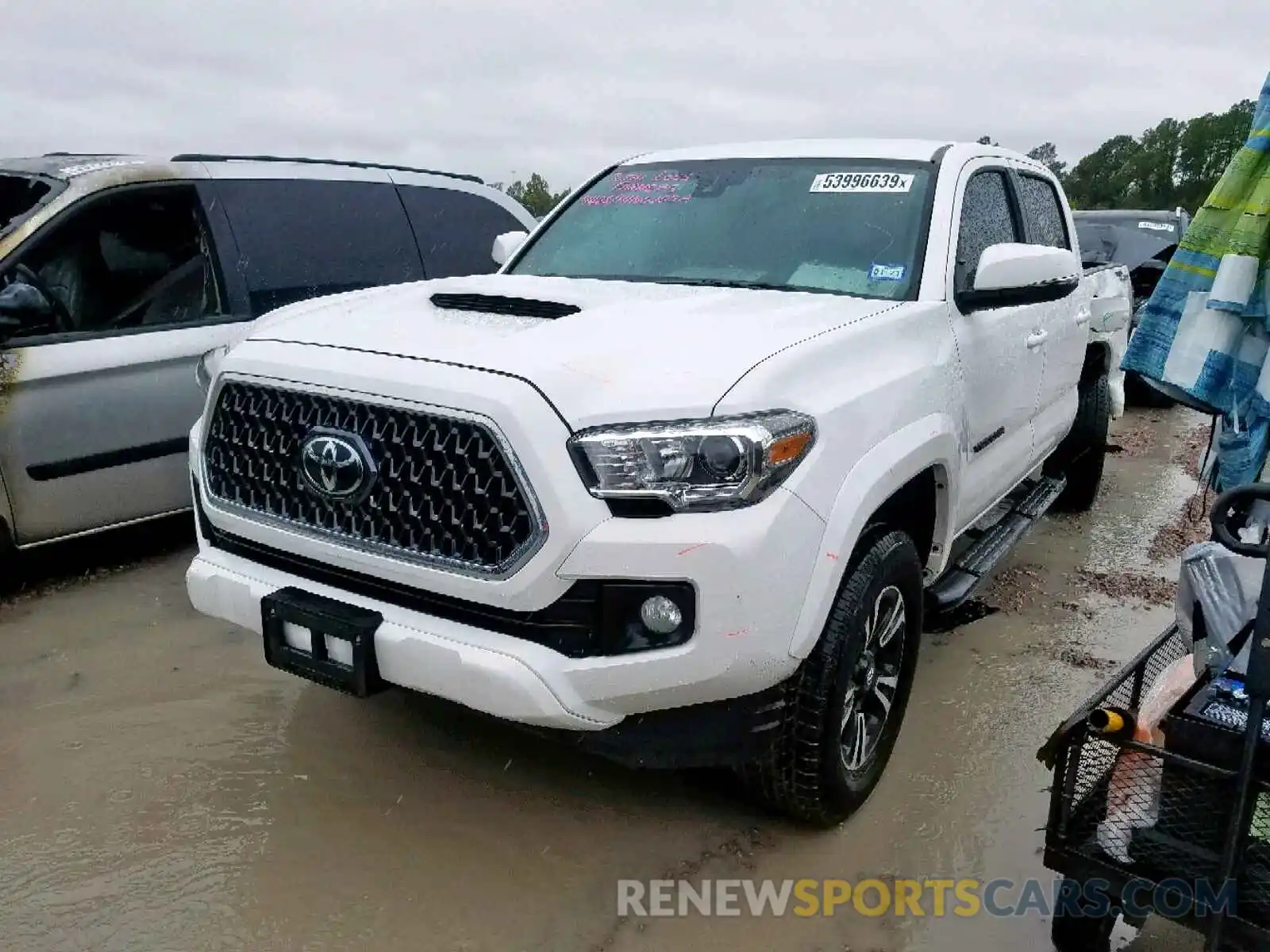 2 Photograph of a damaged car 5TFAZ5CN0KX077556 TOYOTA TACOMA DOU 2019