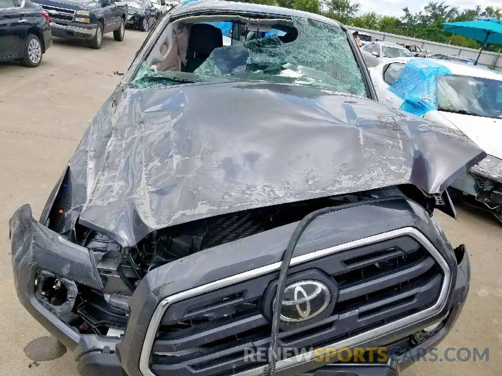 7 Photograph of a damaged car 5TFAZ5CN0KX081302 TOYOTA TACOMA DOU 2019