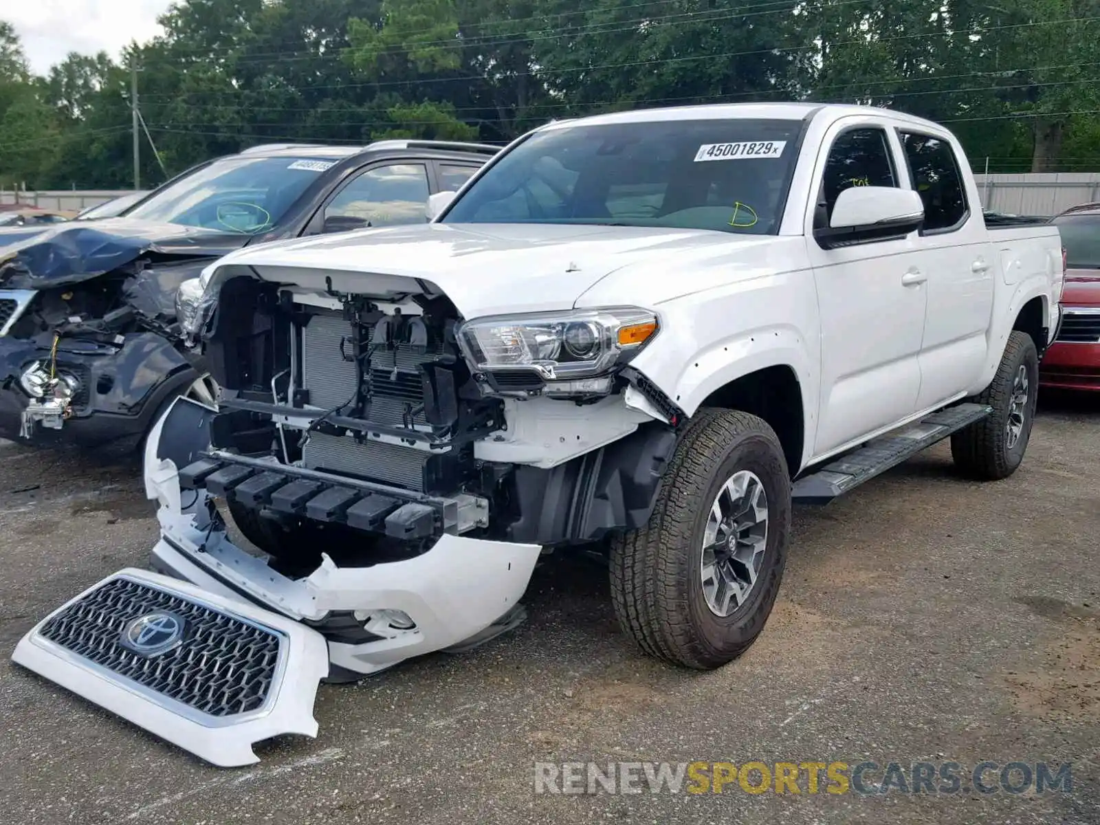 2 Photograph of a damaged car 5TFAZ5CN3KX075820 TOYOTA TACOMA DOU 2019