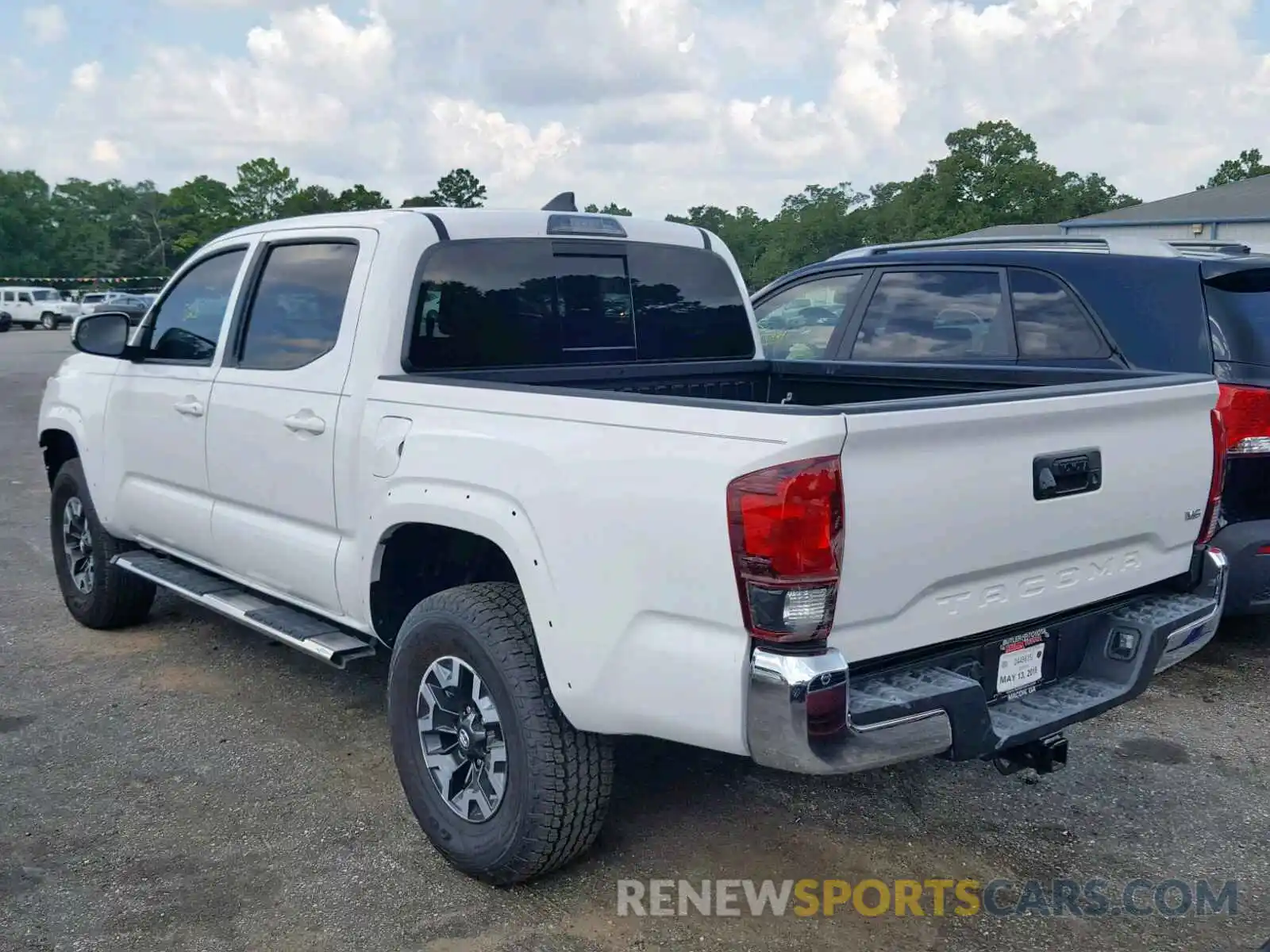 3 Photograph of a damaged car 5TFAZ5CN3KX075820 TOYOTA TACOMA DOU 2019