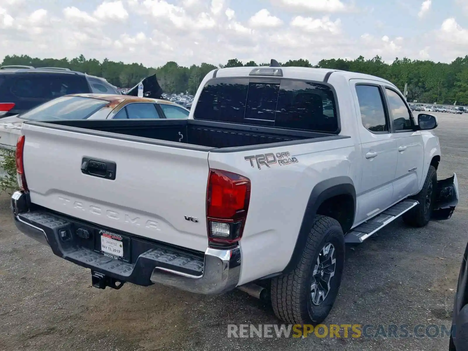 4 Photograph of a damaged car 5TFAZ5CN3KX075820 TOYOTA TACOMA DOU 2019