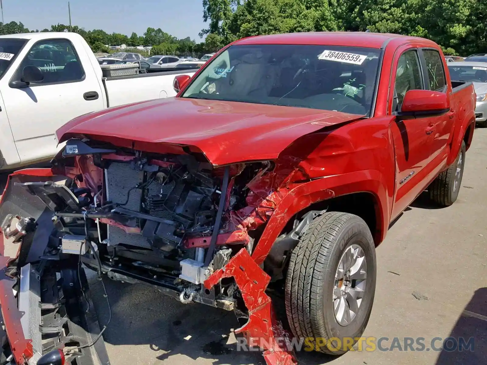 2 Photograph of a damaged car 5TFAZ5CN4KX078855 TOYOTA TACOMA DOU 2019