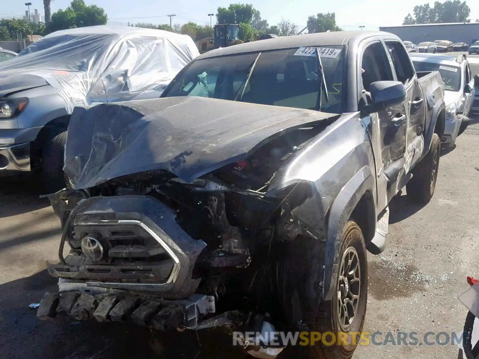 2 Photograph of a damaged car 5TFAZ5CN4KX083246 TOYOTA TACOMA DOU 2019